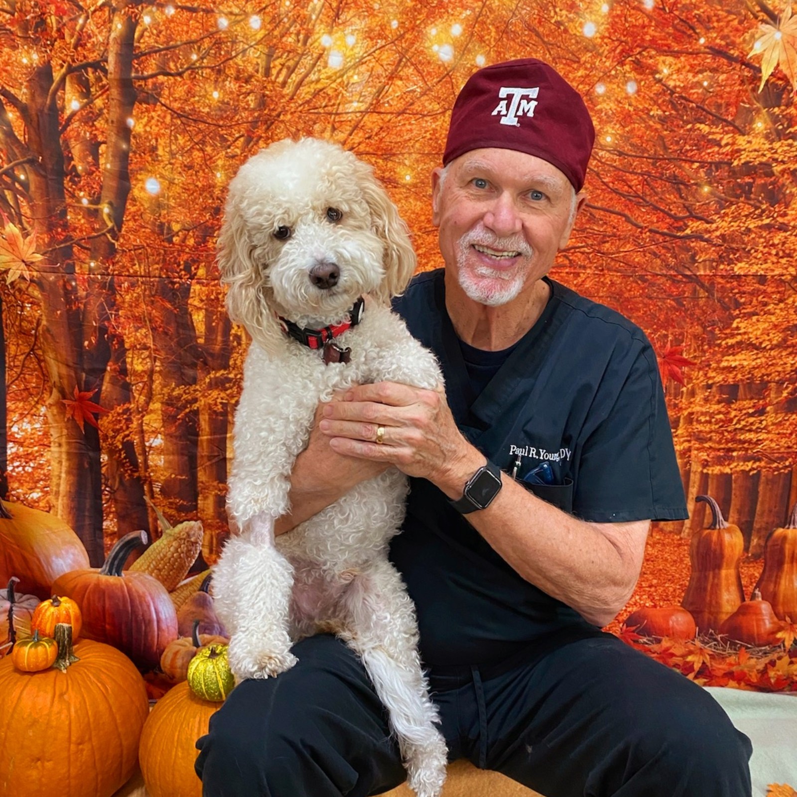 Man holding pet dog